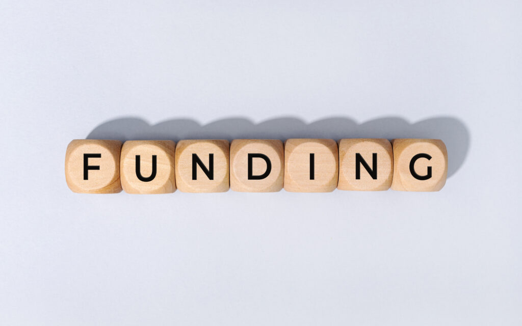 funding-word-on-wooden-block